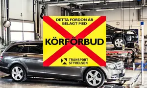 Bilverkstad med en skylt om körförbud. En efterkontroll besiktning 2 månader kan vara nödvändig.